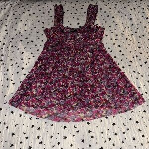 Express purple floral flowy baby doll top. Size S.